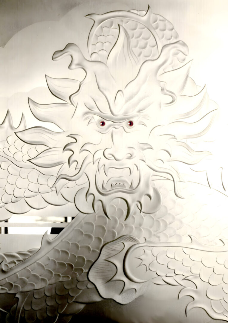 A white dragon mural painted on the wall.